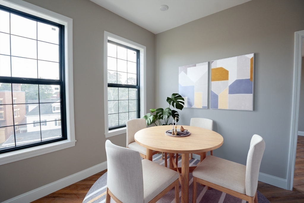 13 Nahant Street, Unit 2D Lynn, MA 01902 - Photo 3 of 11 a dining room with furniture and window