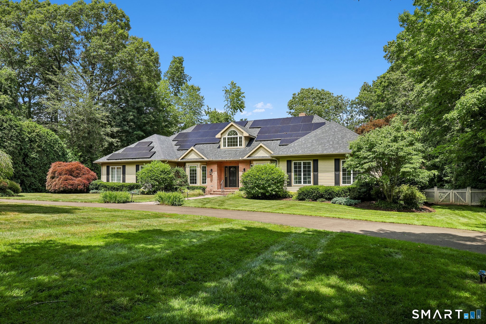 72 Strawberry Hill Road Madison, CT 06443 - Photo 3 of 40 There's a semi-circular drive that leads to the front door, and to the 3 car garage. The fenced yard is lovely and there's an irrigation system for the lawn