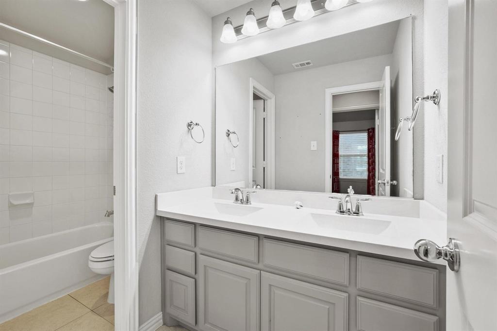 3500 Jersey Road Melissa, TX 75454 - Photo 27 of 40 a bathroom with a sink double vanity and a bathtub