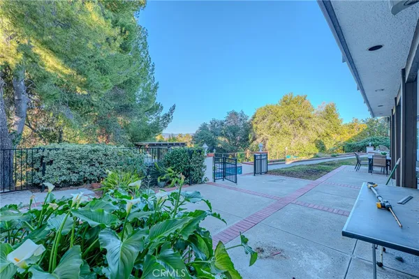 a view of a backyard with a garden