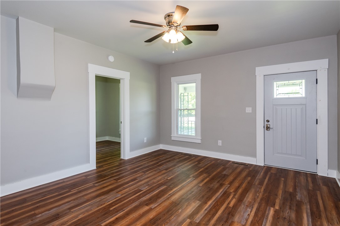 1217 Jasper Road Xenia, OH 45385 - Photo 28 of 62 This inviting space features durable flooring and a ceiling fan, creating a comfortable living area.