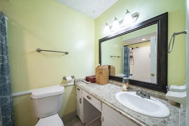 a view of a yard covered in snow