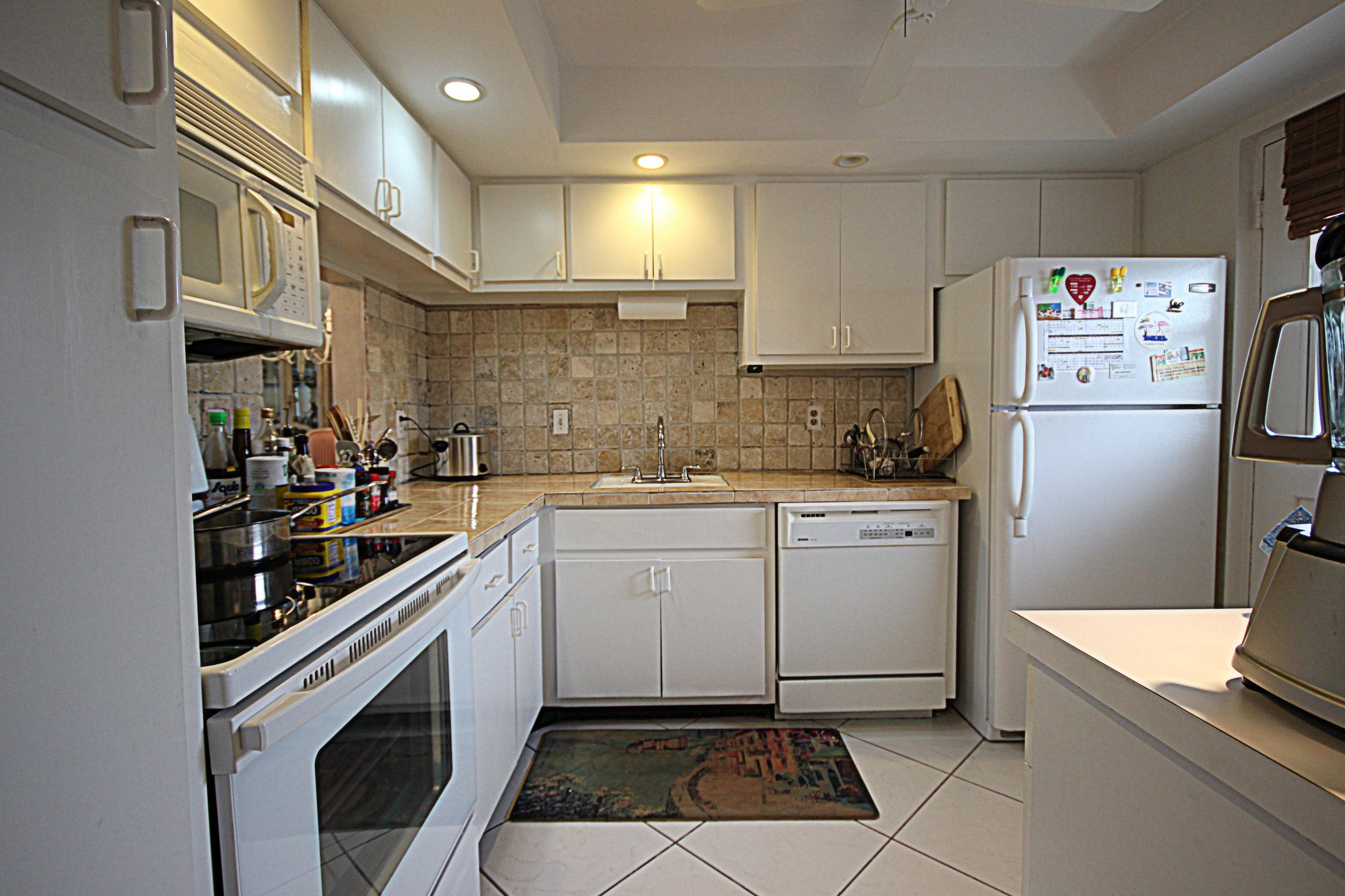 5700 Northwest 2nd Avenue, Unit 210 Boca Raton, FL 33487 - Photo 7 of 19 KIT 5700 NW 2ND AVE 210 (2)