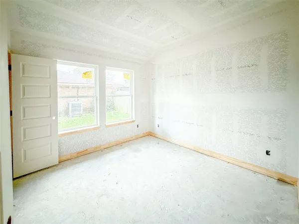 an empty room with windows