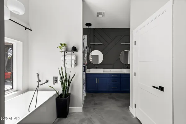 a kitchen with a stove a sink and a cabinet