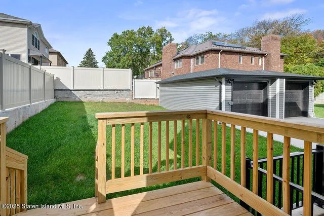 a white toilet sitting next to a shower