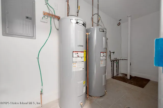 a view of room with window and wooden floor