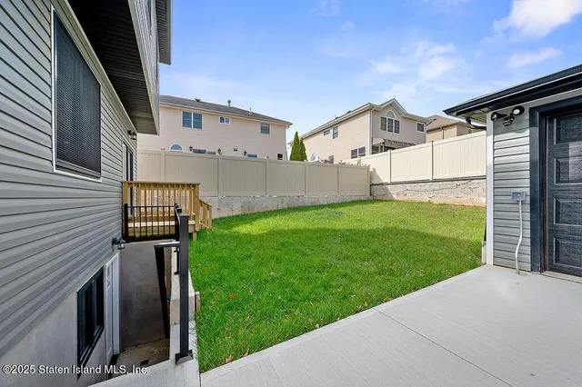 a house with garden in front of it