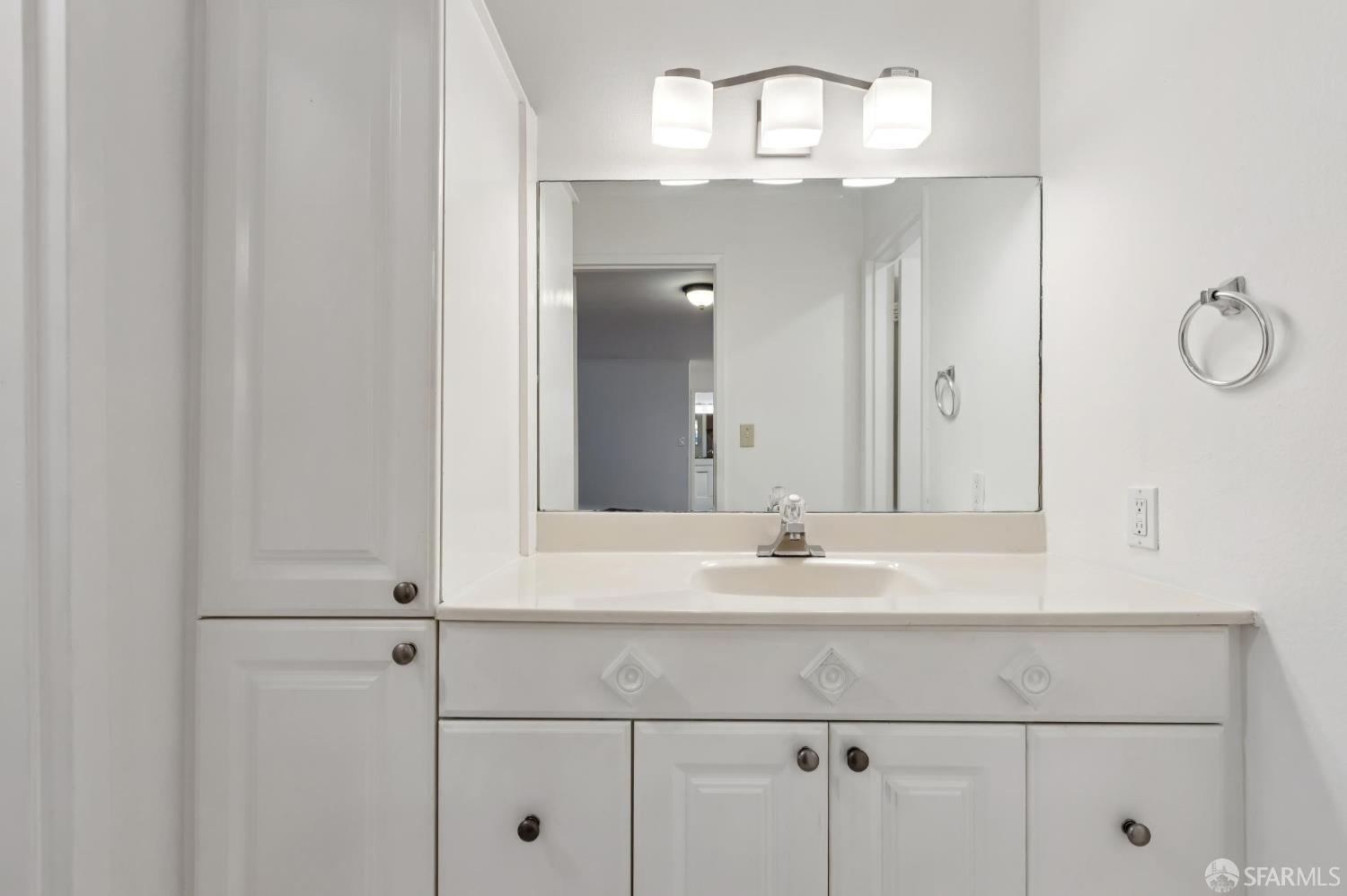 368 Imperial Way, Unit 233 Daly City, CA 94015 - Photo 21 of 39 a bathroom with a sink and a mirror