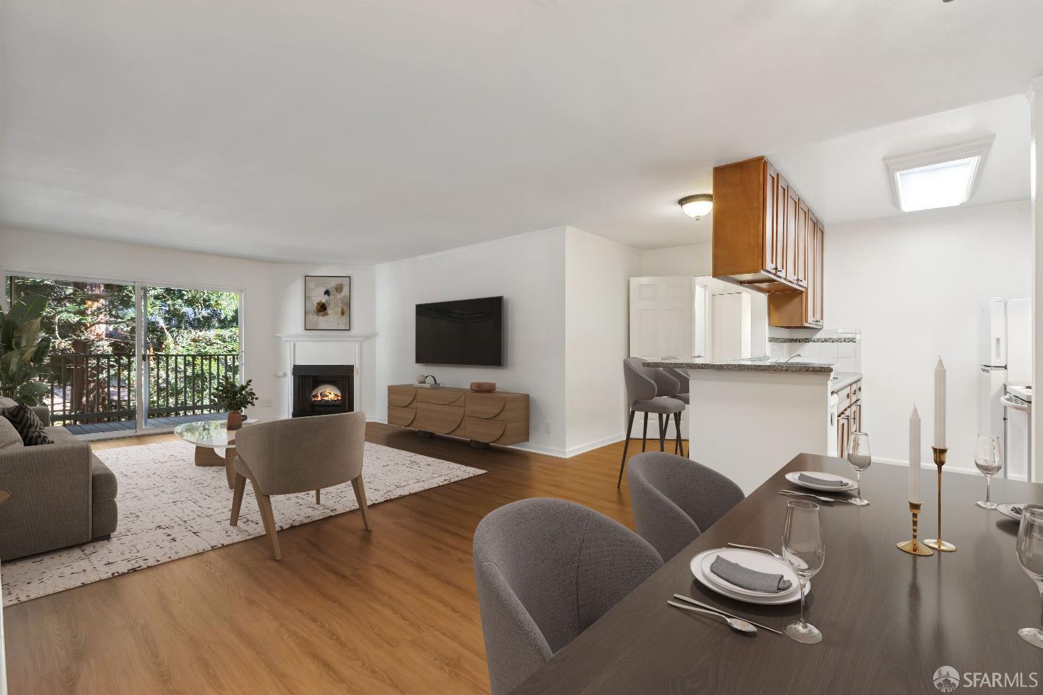 368 Imperial Way, Unit 233 Daly City, CA 94015 - Photo 4 of 39 a living room with furniture and a flat screen tv