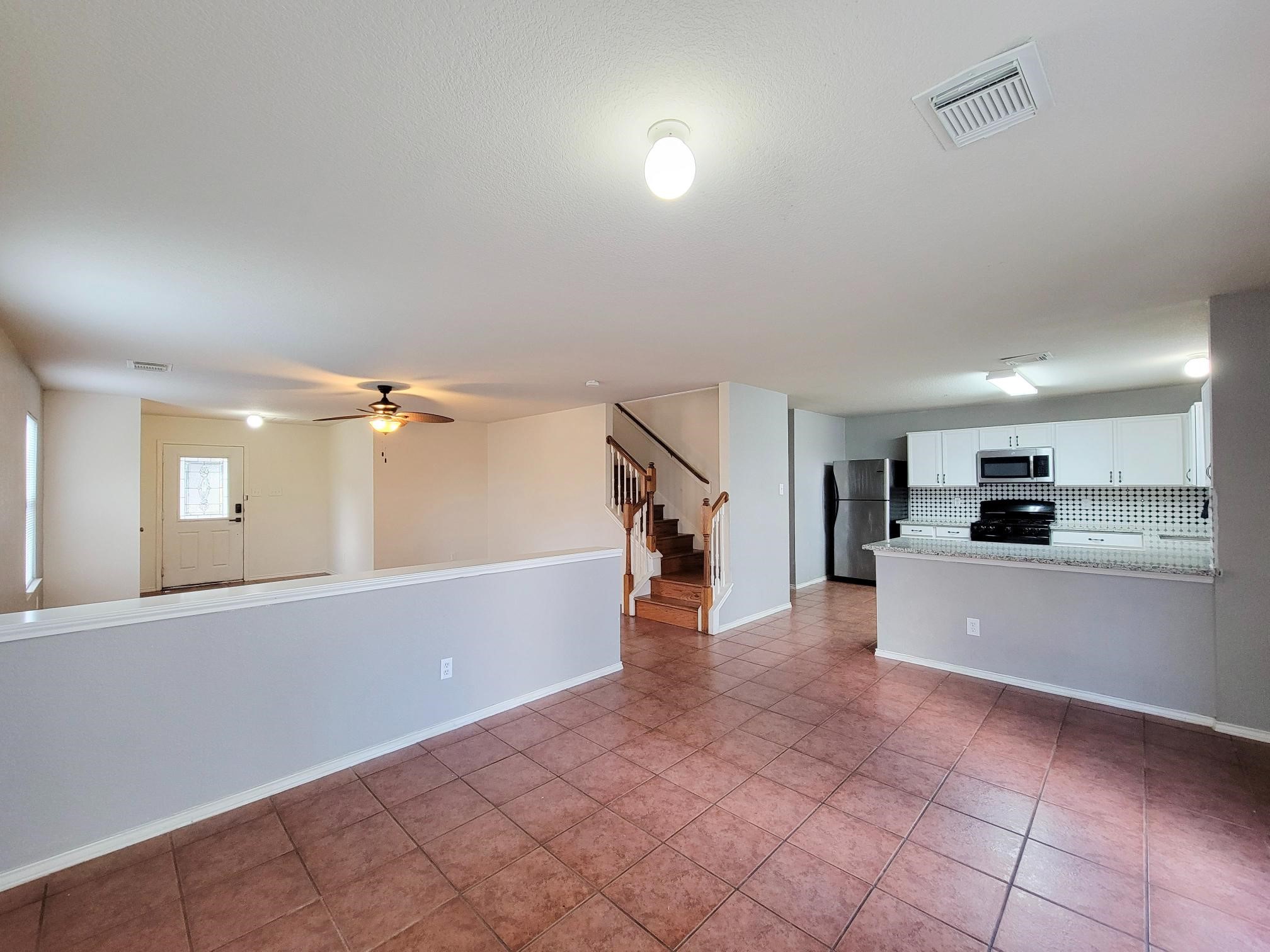 16306 Kendons Way Lane Cypress, TX 77429 - Photo 13 of 39 a view of a kitchen with a sink and cabinets