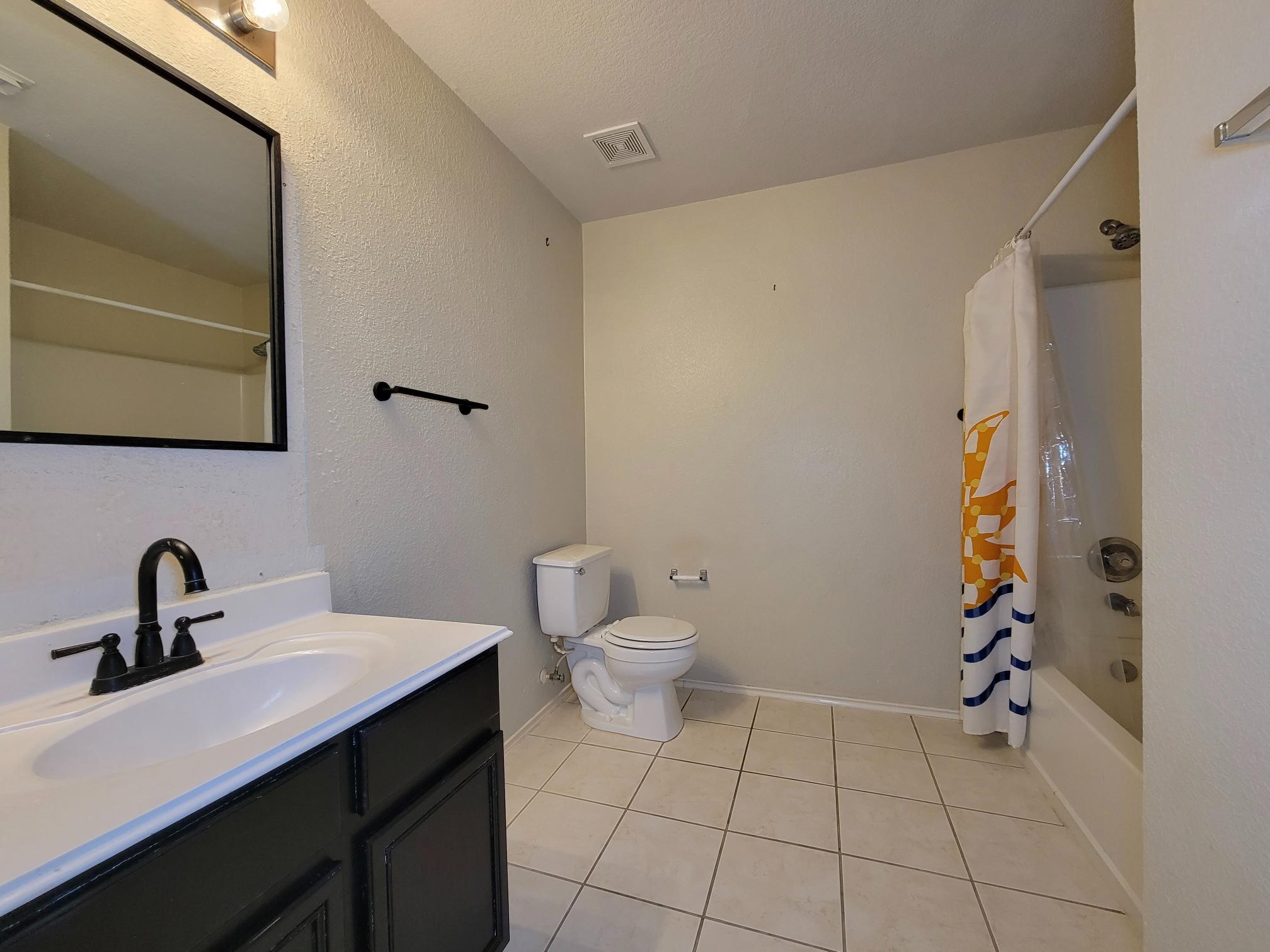 16306 Kendons Way Lane Cypress, TX 77429 - Photo 21 of 39 a bathroom with a sink a toilet and shower