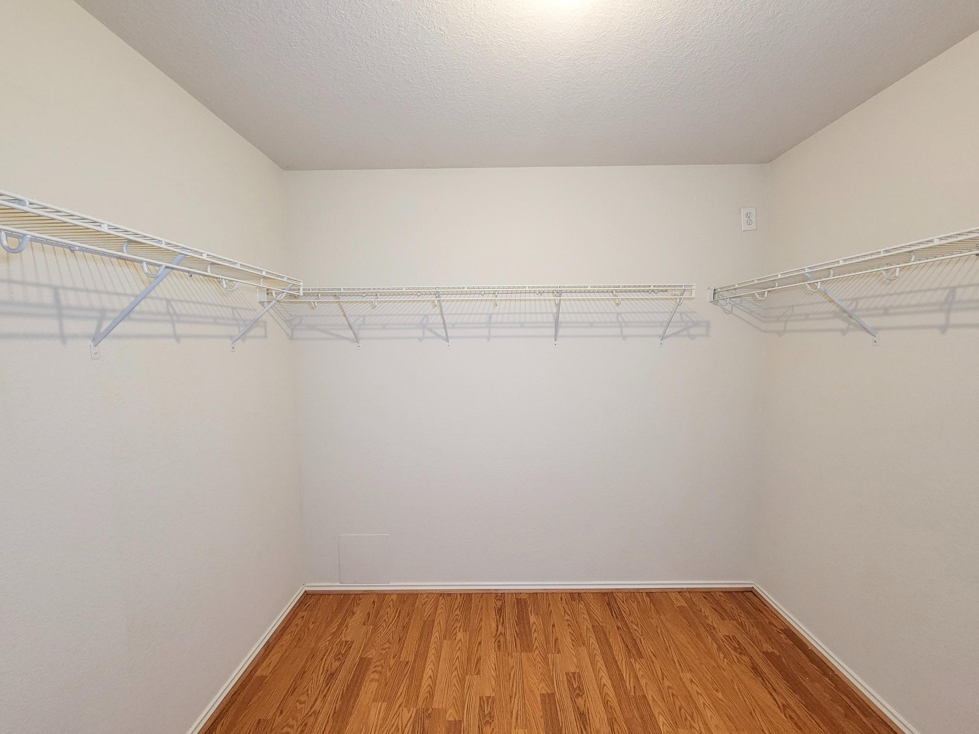 16306 Kendons Way Lane Cypress, TX 77429 - Photo 26 of 39 a view of a room with racks on the wall