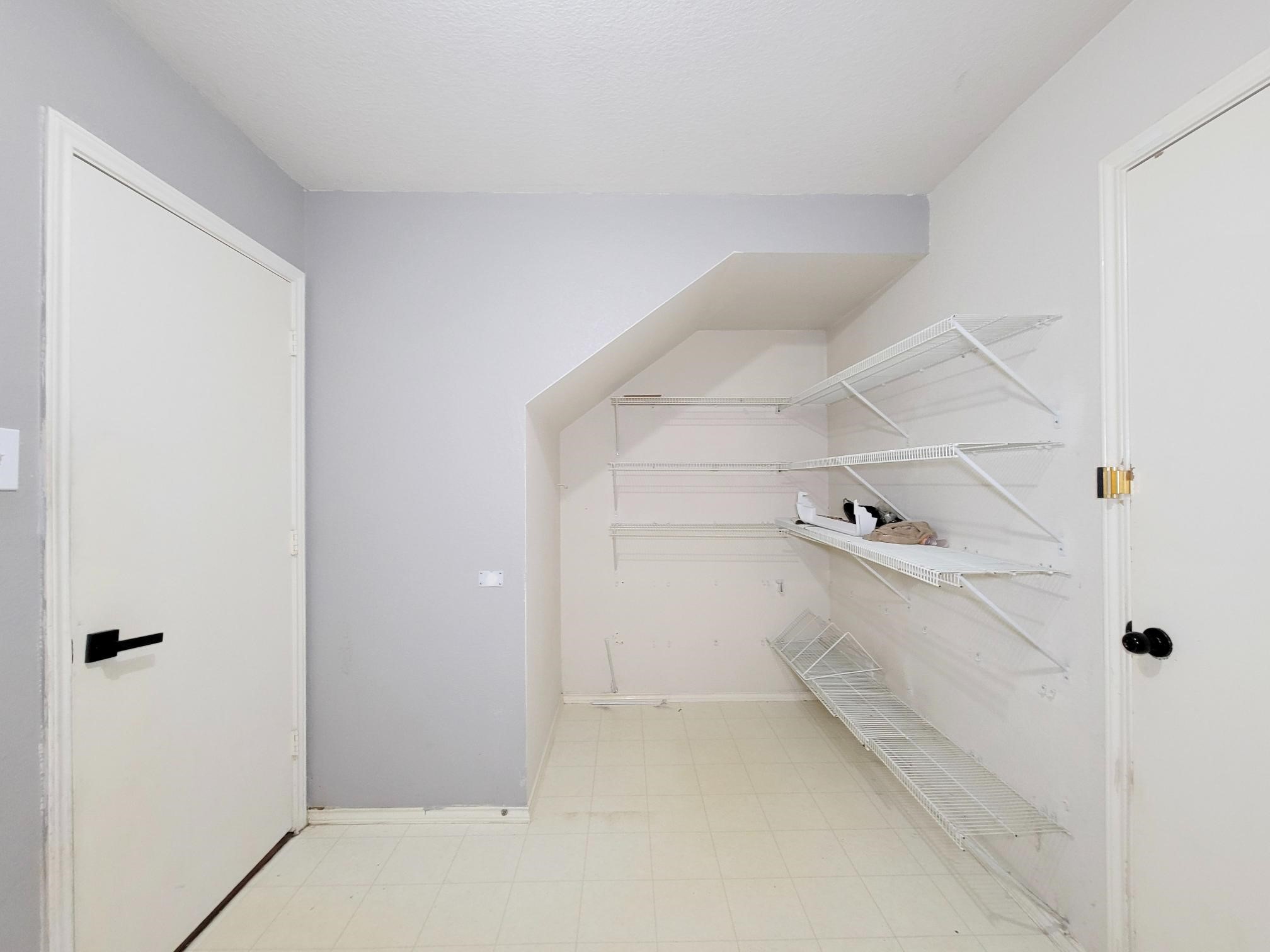 16306 Kendons Way Lane Cypress, TX 77429 - Photo 35 of 39 a view of storage and utility room with closet