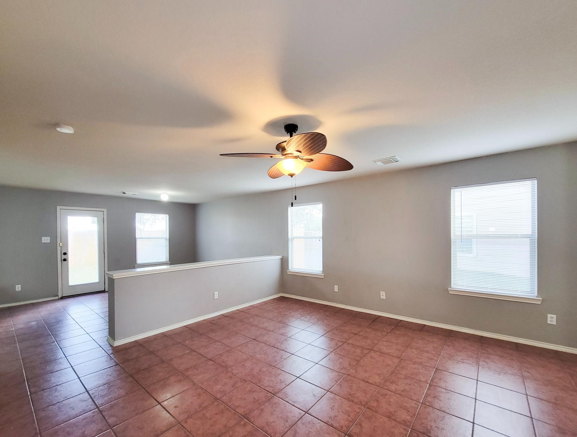 16306 Kendons Way Lane Cypress, TX 77429 - Photo 8 of 39 a view of an empty room and window
