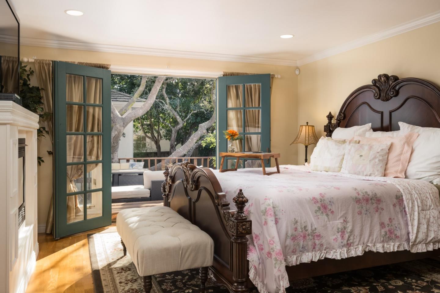 25064 Hatton Road Carmel, CA 93923 - Photo 15 of 21 a bedroom with a bed and a large window