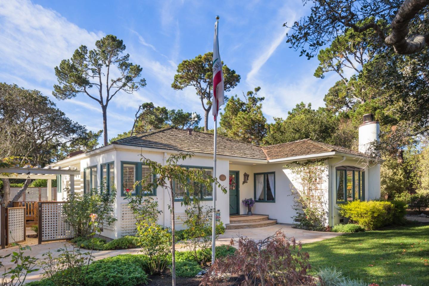 25064 Hatton Road Carmel, CA 93923 - Photo 3 of 21 a front view of a house with garden