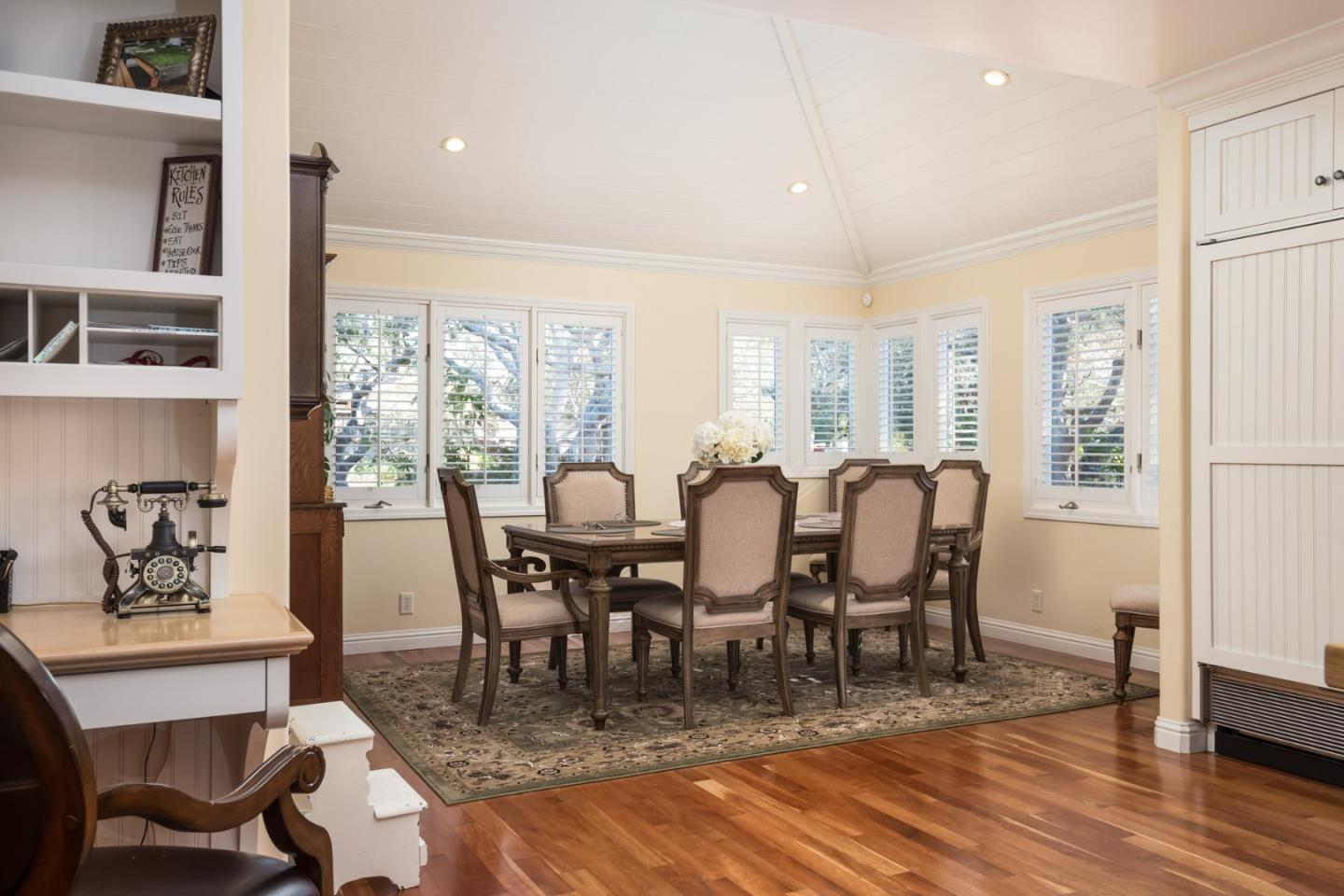 25064 Hatton Road Carmel, CA 93923 - Photo 10 of 21 a view of a dining room with furniture window and wooden floor