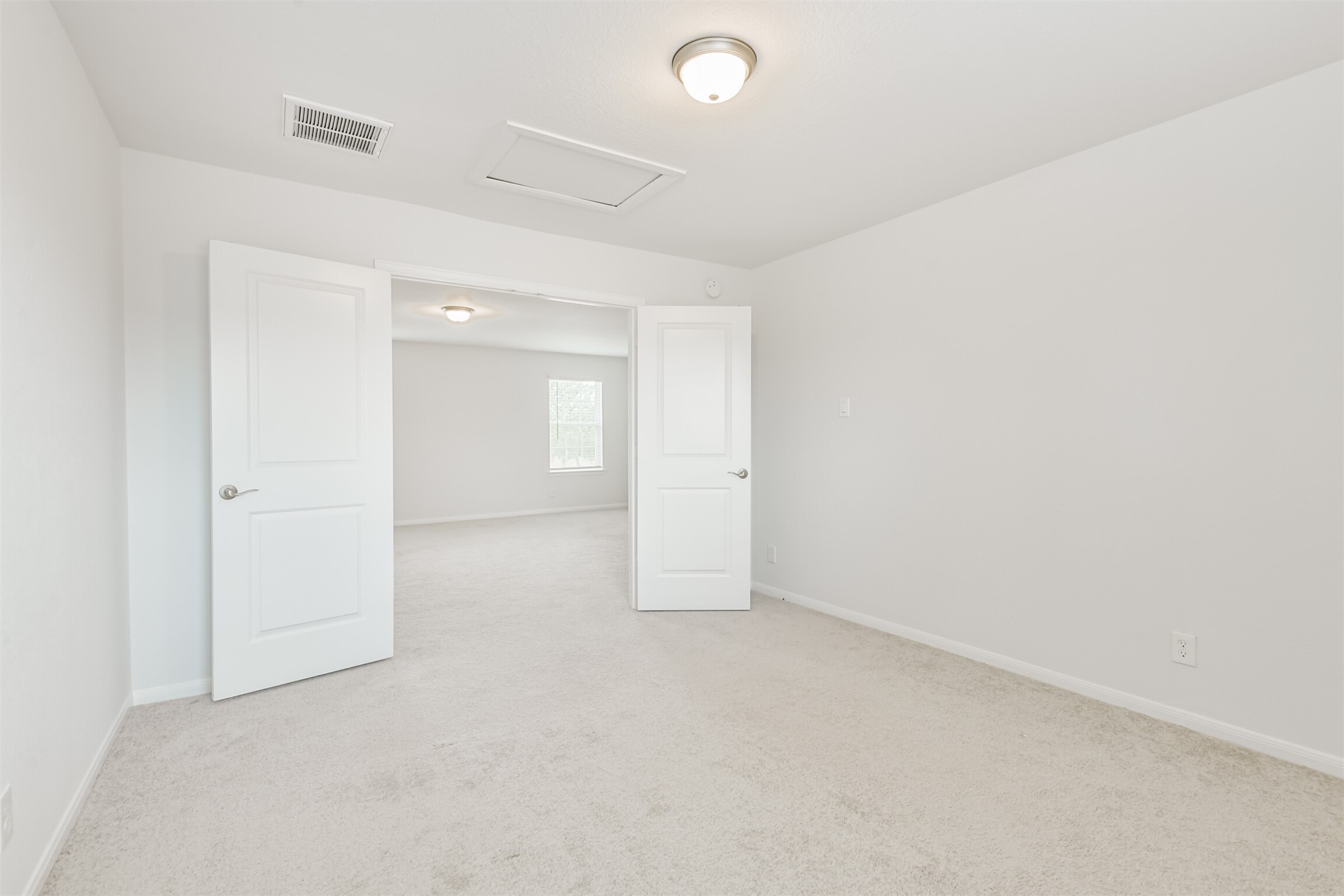 2129 Solstice Boulevard Spring, TX 77386 - Photo 39 of 49 Bedroom / Flex Room:
Versatile upstairs room with neutral tones and double doors that open to the game room. Ideal as a bedroom, media room, playroom, or home office. Bright and spacious with easy access to the rest of the second floor.