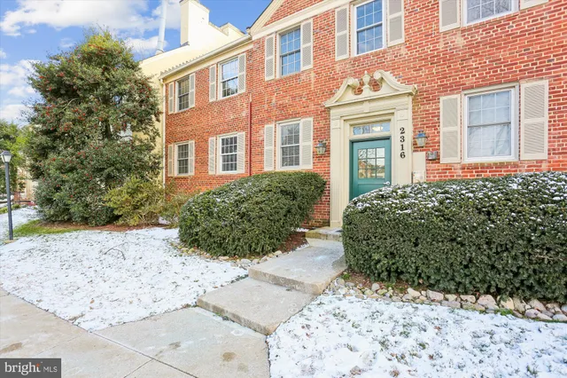 a view of a building with potted plants
