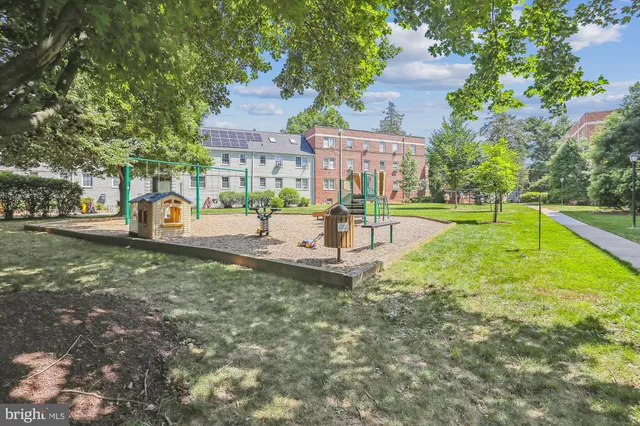 a view of a garden with a patio
