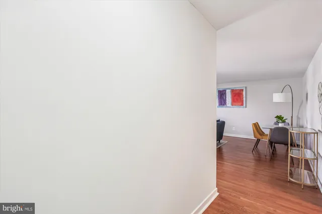 a view of a livingroom with furniture and wooden floor