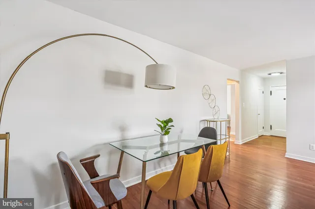 a workspace with furniture and wooden floor