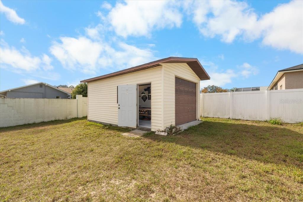 10290 Bannock Street Spring Hill, FL 34608 - Photo 22 of 40 a view of a backyard
