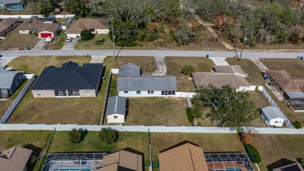 10290 Bannock Street Spring Hill, FL 34608 - Photo 32 of 40 an aerial view of a house with outdoor space