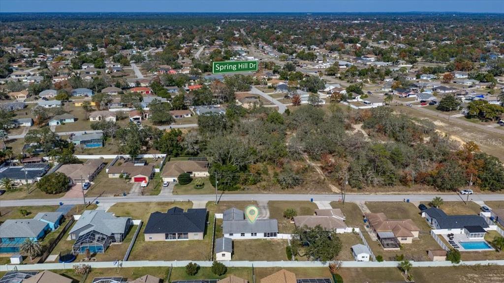10290 Bannock Street Spring Hill, FL 34608 - Photo 33 of 40 an aerial view of residential houses with outdoor space