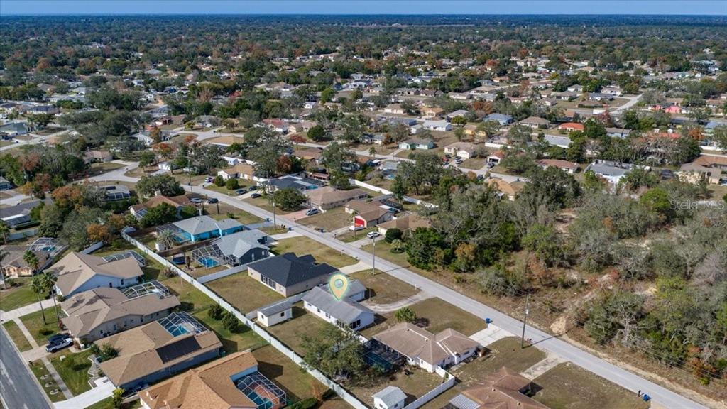 10290 Bannock Street Spring Hill, FL 34608 - Photo 34 of 40 an aerial view of residential houses with outdoor space
