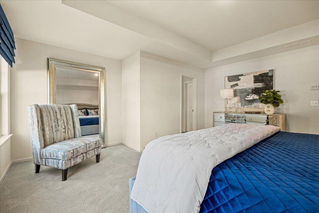 2555 Riverside Court Northeast Conyers, GA 30013 - Photo 26 of 33 a living room with furniture and a wooden floor
