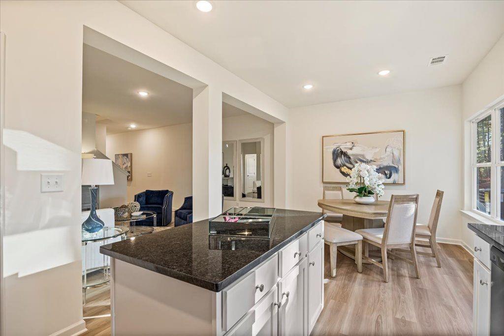 2555 Riverside Court Northeast Conyers, GA 30013 - Photo 9 of 33 a kitchen with a sink and stove