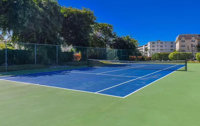 a view of a backyard with sitting area