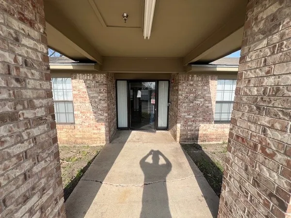 a hallway with a large window