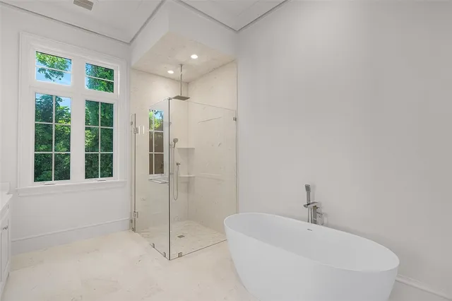 a view of an empty room with a large window