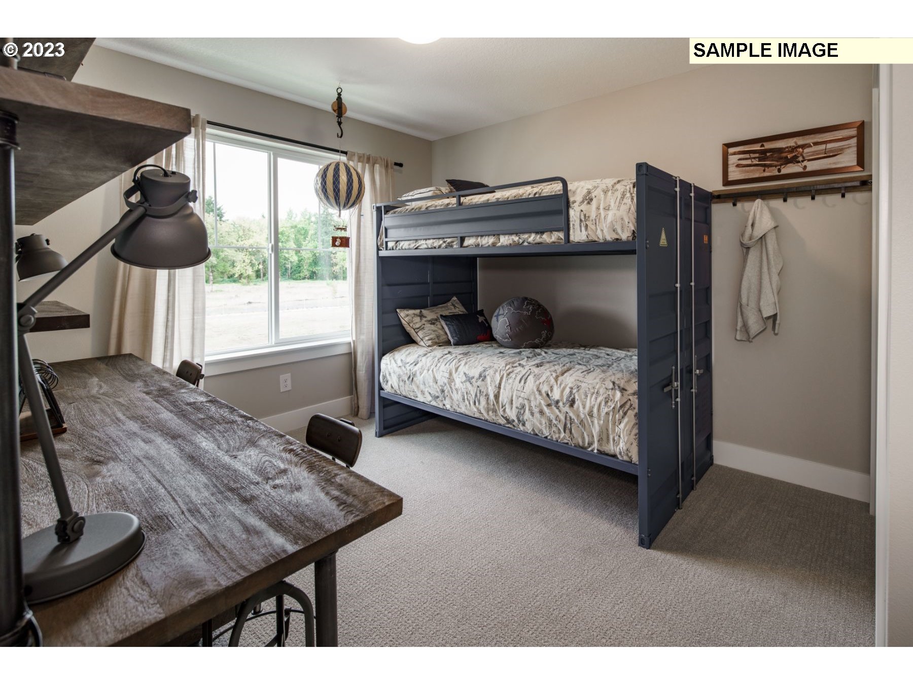 714 Northwest 178th Street Ridgefield, WA 98642 - Photo 20 of 31 a bedroom with furniture and a window
