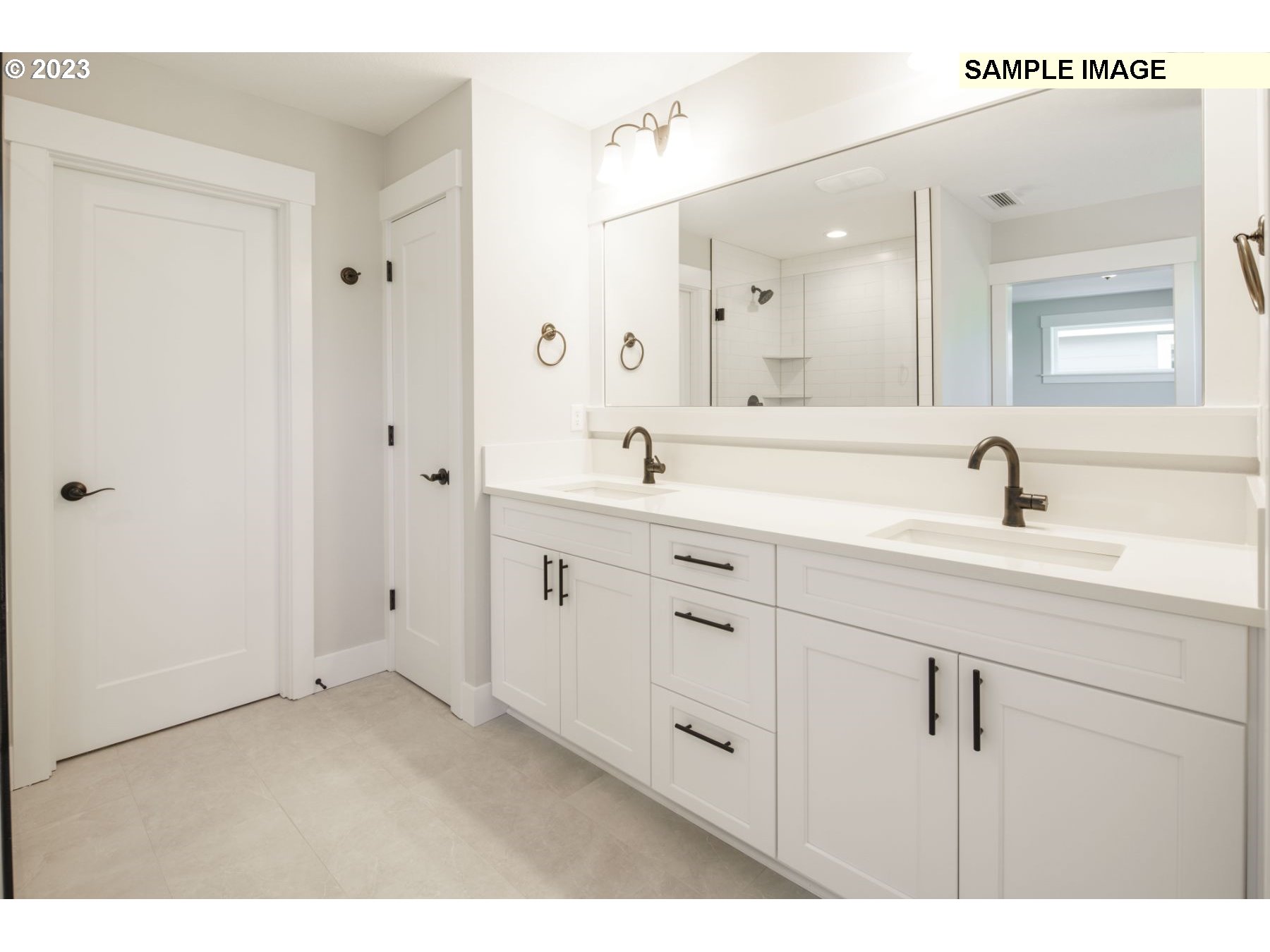 714 Northwest 178th Street Ridgefield, WA 98642 - Photo 30 of 31 a bathroom with a double vanity sink mirror and