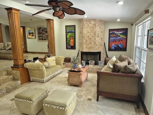 a living room with furniture and a couch