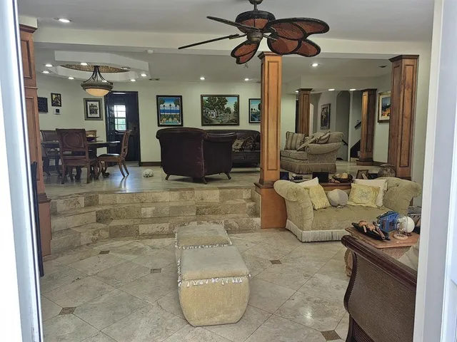 a view of a swimming pool with a patio