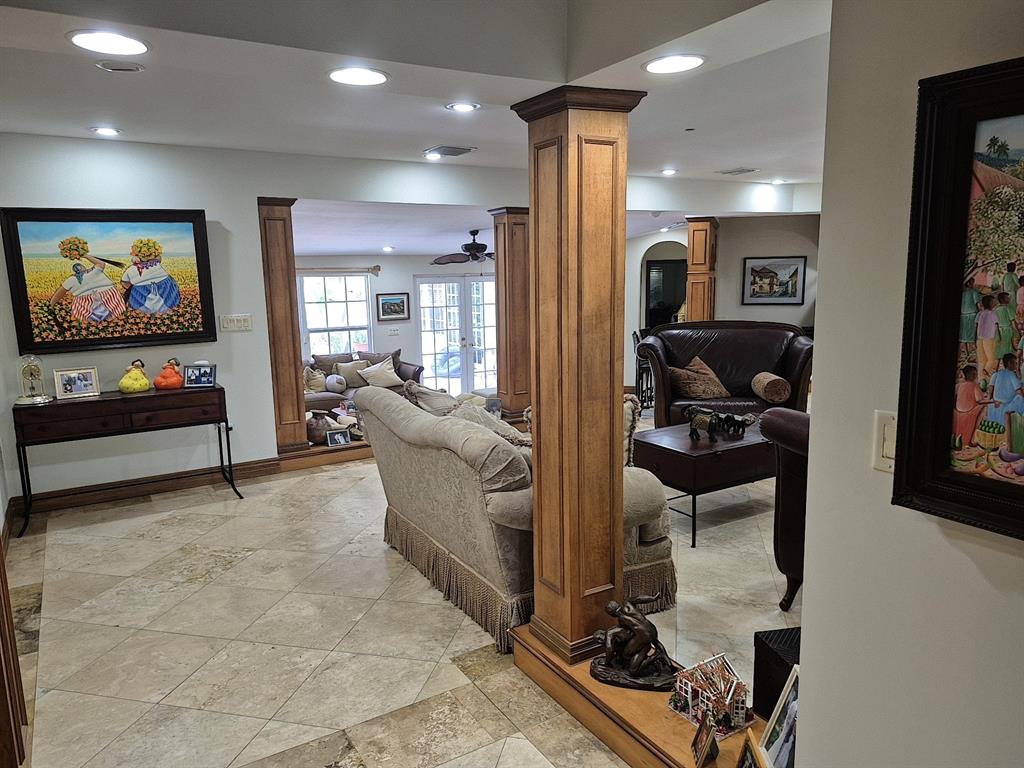 11081 Southwest 30th Court Davie, FL 33328 - Photo 20 of 29 a living room with furniture and a flat screen tv
