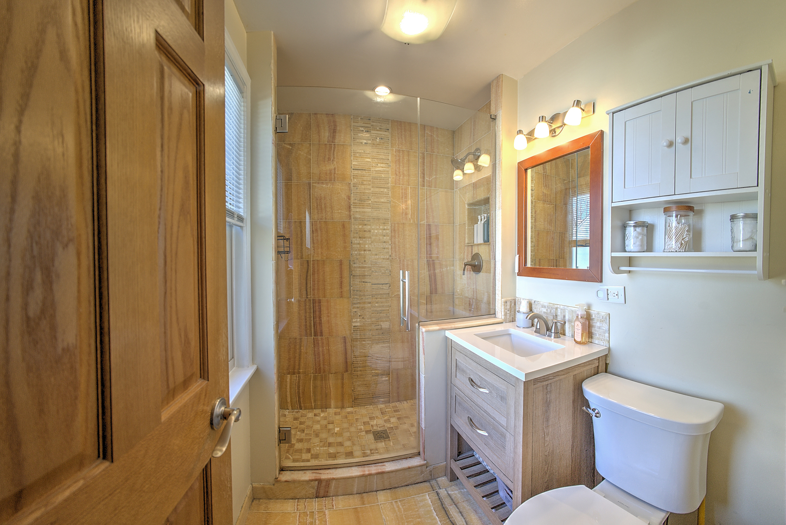501 North Maple Street Mount Prospect, IL 60056 - Photo 25 of 27 a bathroom with a double vanity sink toilet and shower