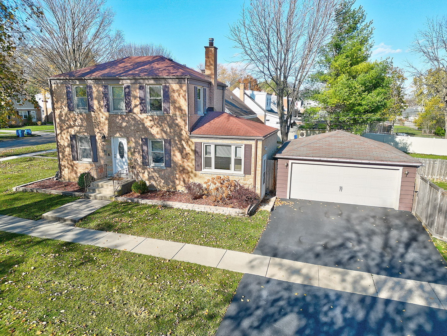 501 North Maple Street Mount Prospect, IL 60056 - Photo 7 of 27 a front view of a house with a yard