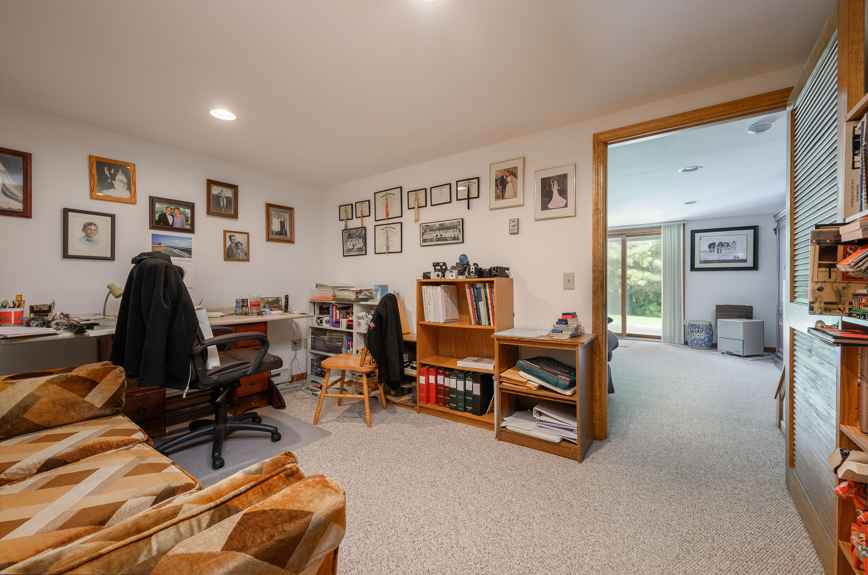 174 Lowell Road, Unit N102 Mashpee, MA 02649 - Photo 28 of 35 a view of a livingroom with workspace and a couch