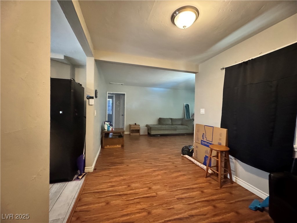1409 Joshua Way Las Vegas, NV 89101 - Photo 8 of 15 Hall with wood finished floors and baseboards