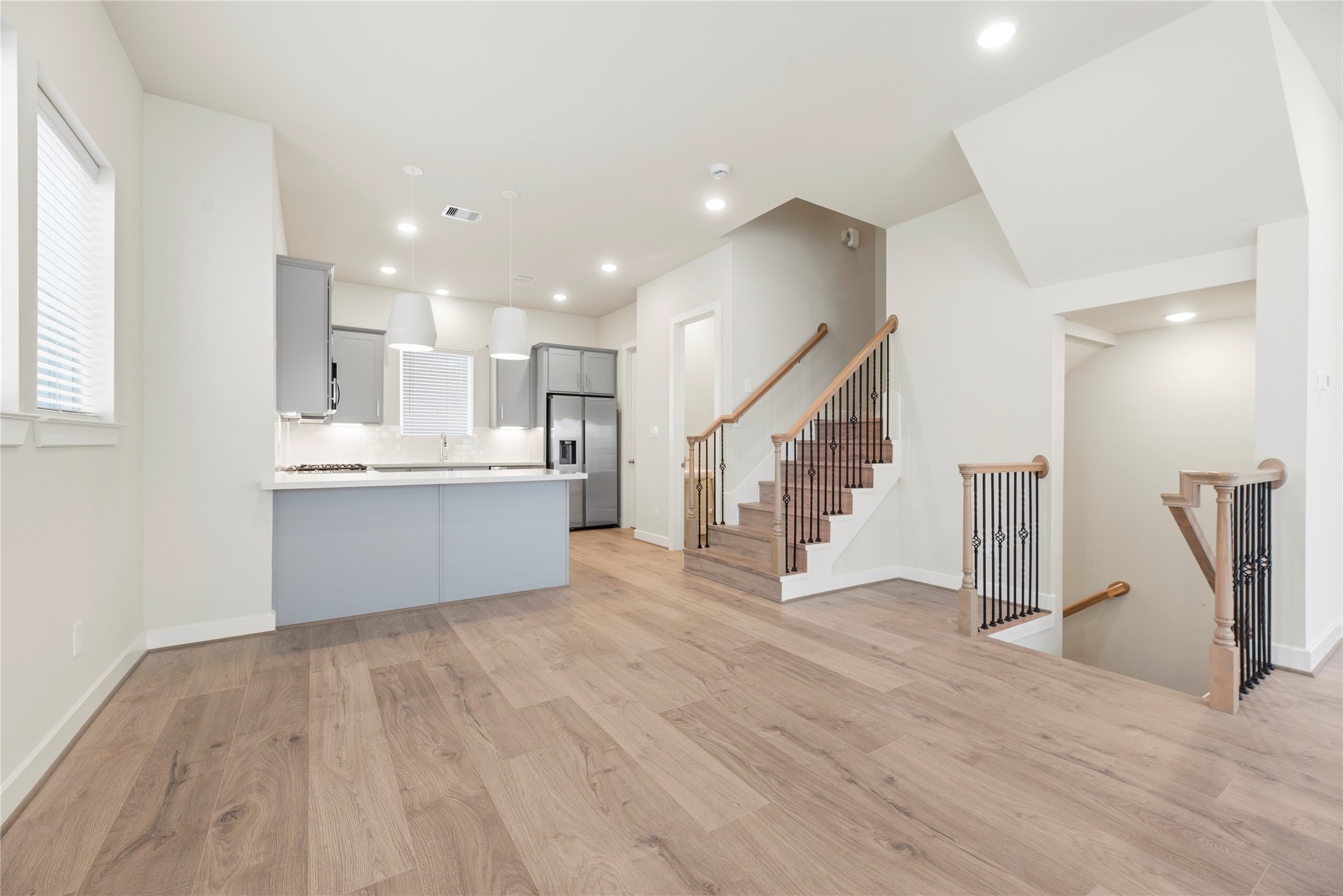 3075 Hicks Street Houston, TX 77007 - Photo 9 of 34 a view of kitchen and wooden floor