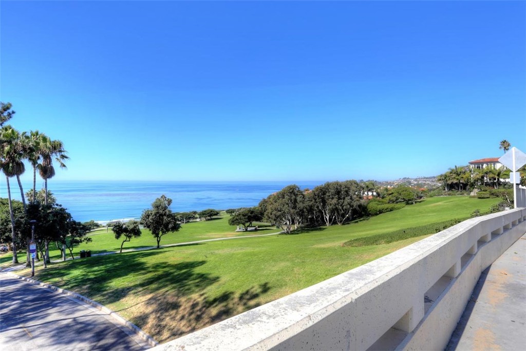 25422 Neptune Drive, Unit B Dana Point, CA 92629 - Photo 13 of 13 a view of a golf course with a lake