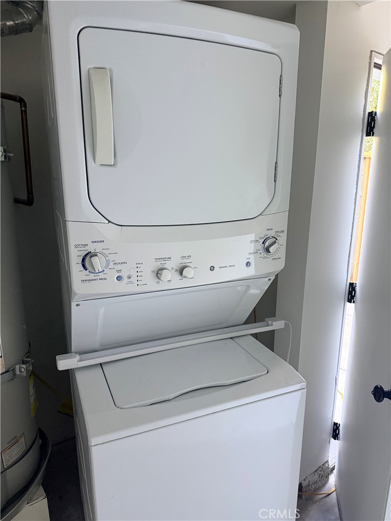 25422 Neptune Drive, Unit B Dana Point, CA 92629 - Photo 5 of 13 a utility room with dryer and washer