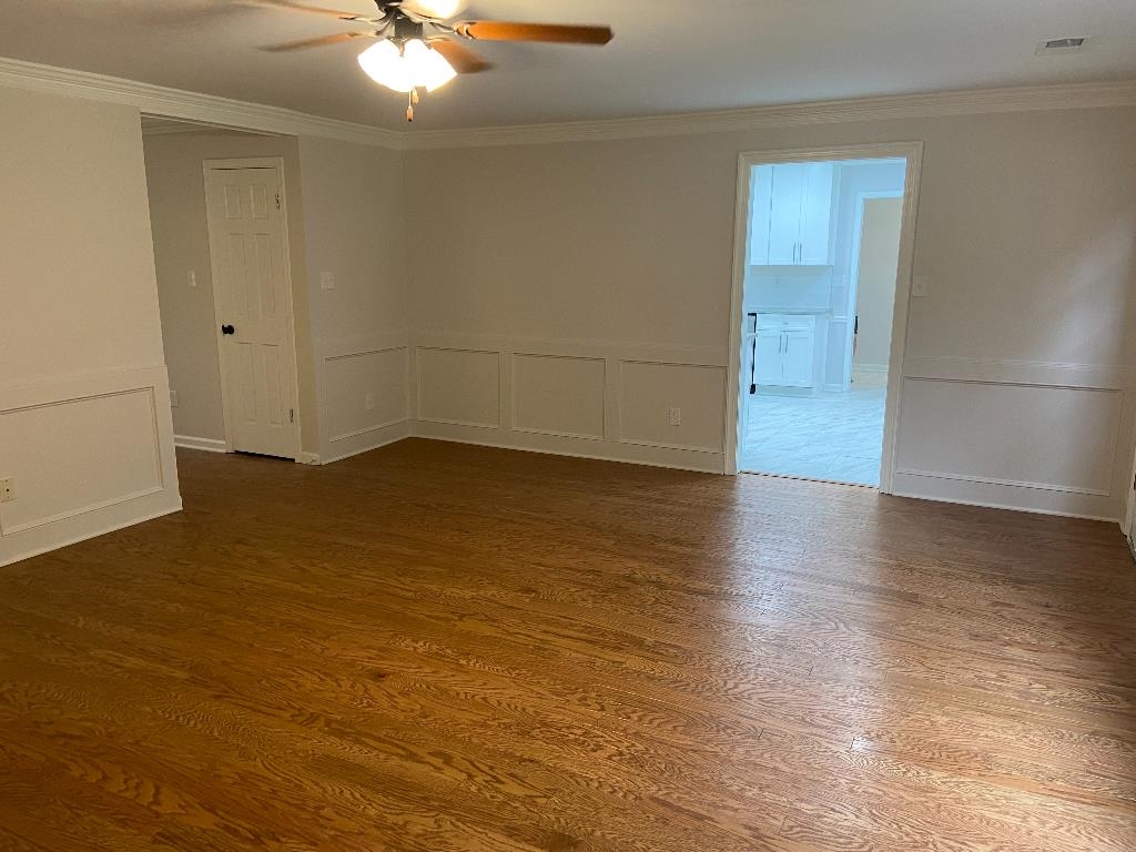 1212 Heather Ridge Cove Collierville, TN 38017 - Photo 5 of 25 wooden floor in an empty room