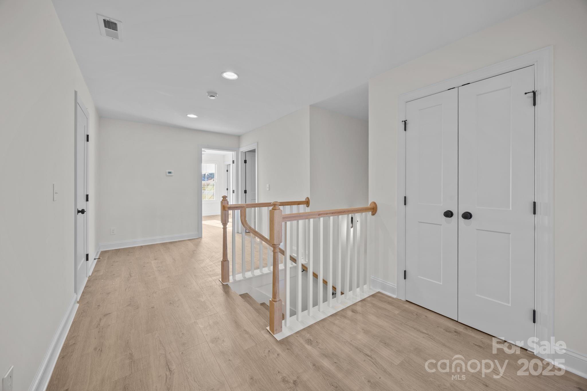 1325 Coppergate Drive Salisbury, NC 28147 - Photo 25 of 47 a view of a hallway with wooden floor and entryway